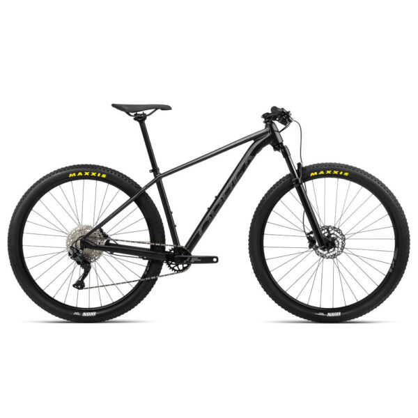 "Bicicleta de montaña Orbea Onna 29 20 2023 con cuadro de aleación de aluminio, horquilla SR Suntour de 100mm y frenos hidráulicos Shimano MT200, ideal para iniciarse en MTB".