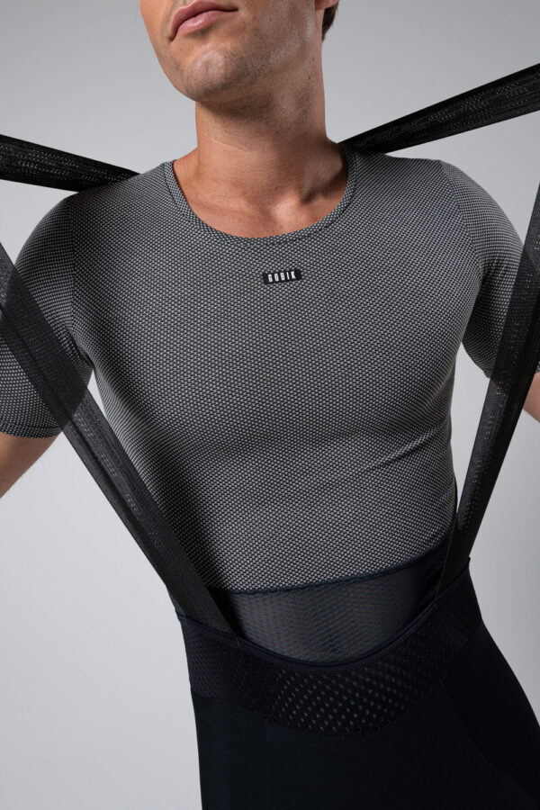 Culotte largo de ciclismo con protección térmica DUAL-SHIELD, badana K7, tirantes transpirables y detalles reflectantes, ideal para entrenamientos en temperaturas de 0-15 ºC. Ofrece aislamiento, transpirabilidad y confort durante rutas largas.