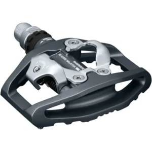 "Pedales Shimano EH500 SPD de doble cara, lado plano y lado automático, ligeros y resistentes, ideales para ciclismo urbano y rutas deportivas."