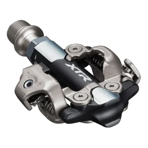 "Pedales Shimano XTR M9100 SPD XC automáticos para ciclismo de montaña, diseño ligero y resistente, ideales para cross-country."