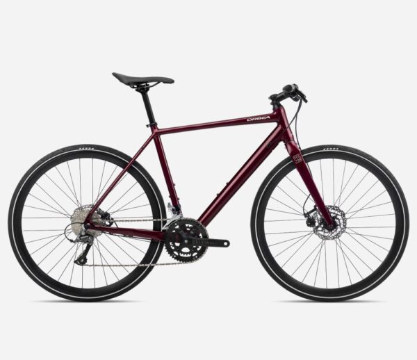 Bicicleta urbana Orbea Urban Speed con cuadro de aluminio 6000, transmisión Shimano Claris 8 velocidades, frenos mecánicos Shimano TX805, y neumáticos Kenda 700x32.