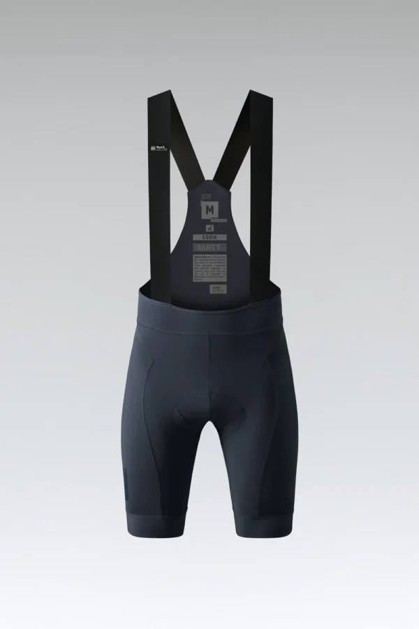 "Culotte corto Gobik Matt 2.0 Compact con acabado mate, bandas elásticas ligeras y transpirables, badana K10 Graphene, tirantes ergonómicos, elementos reflectantes y logotipos de vinilo de alta elasticidad."